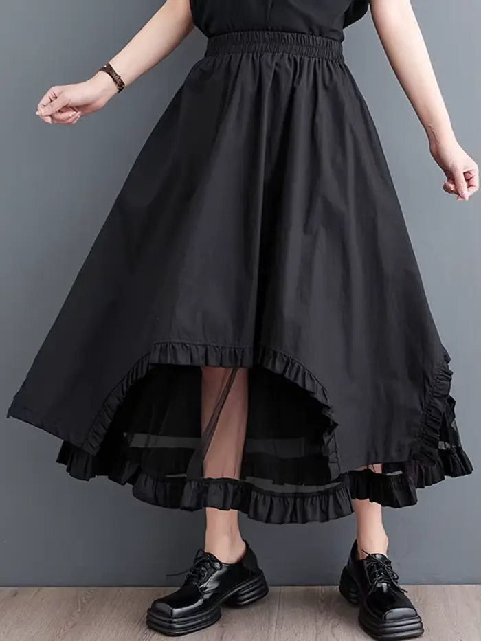 Jupe mi-longue décontractée noire vintage à empiècements en maille, taille haute, coupe irrégulière,