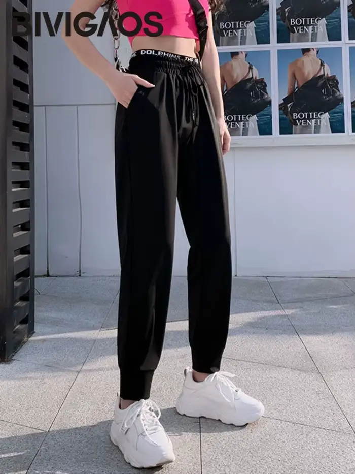 BIVIIncome - Čierne voľné tepláky Ice InjSports pre ženy