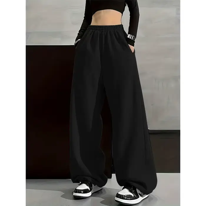 Pantalon à jambes larges confortable de couleur unie avec poche à taille élastique, coupe ample déco