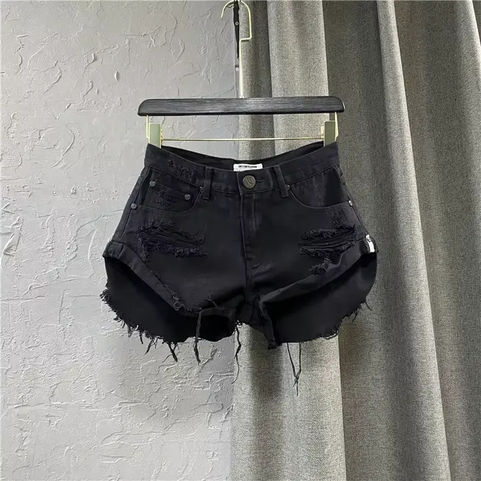Shorts en denim déchirés JCLOTHZI baby blue décontractés pour femmes avec fermeture bouton volant pour l'été