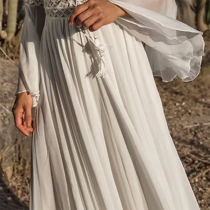 Femmes manches longues évasées col en V blanc creux Boho dentelle Maxi robe femme vacances Chic été