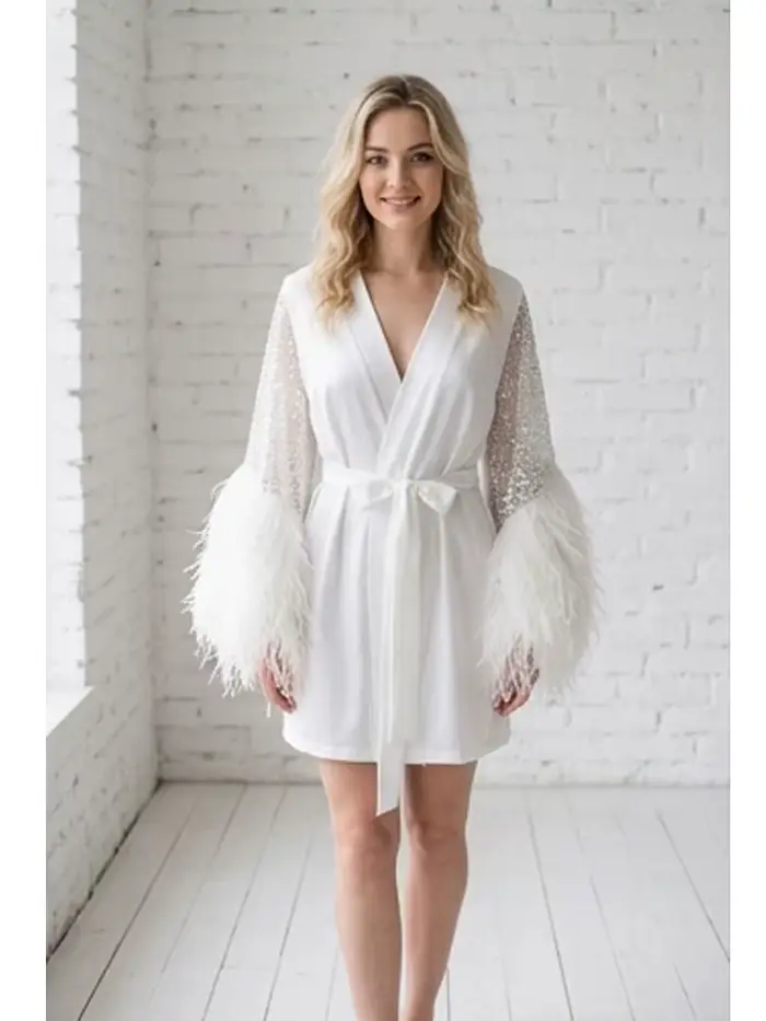 Robe de mariée de luxe en soie satinée avec manches à plumes et sequins pour femmes, idéale pour cérémonies de mariage, soirées de gala et présentations de mode