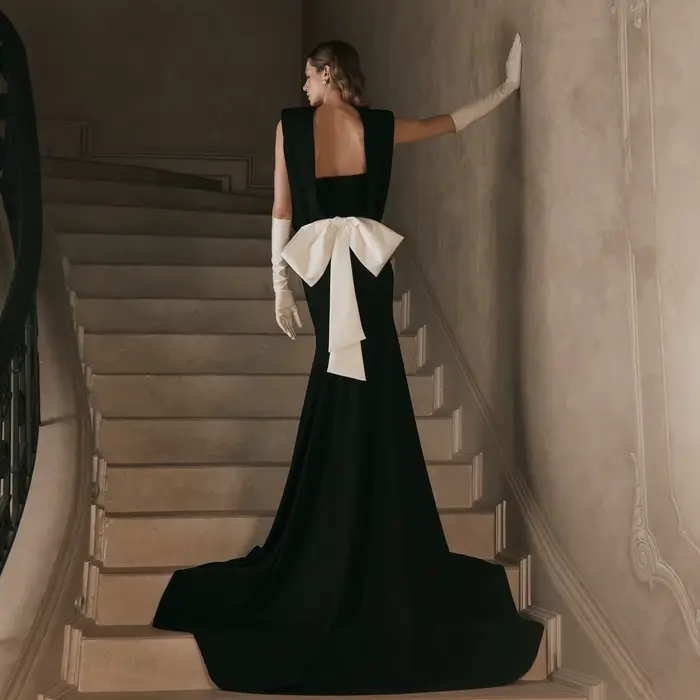 Robe de soirée sirène noire fluide sans dos pour femme, robe de bal longue sans manches avec nœud bl