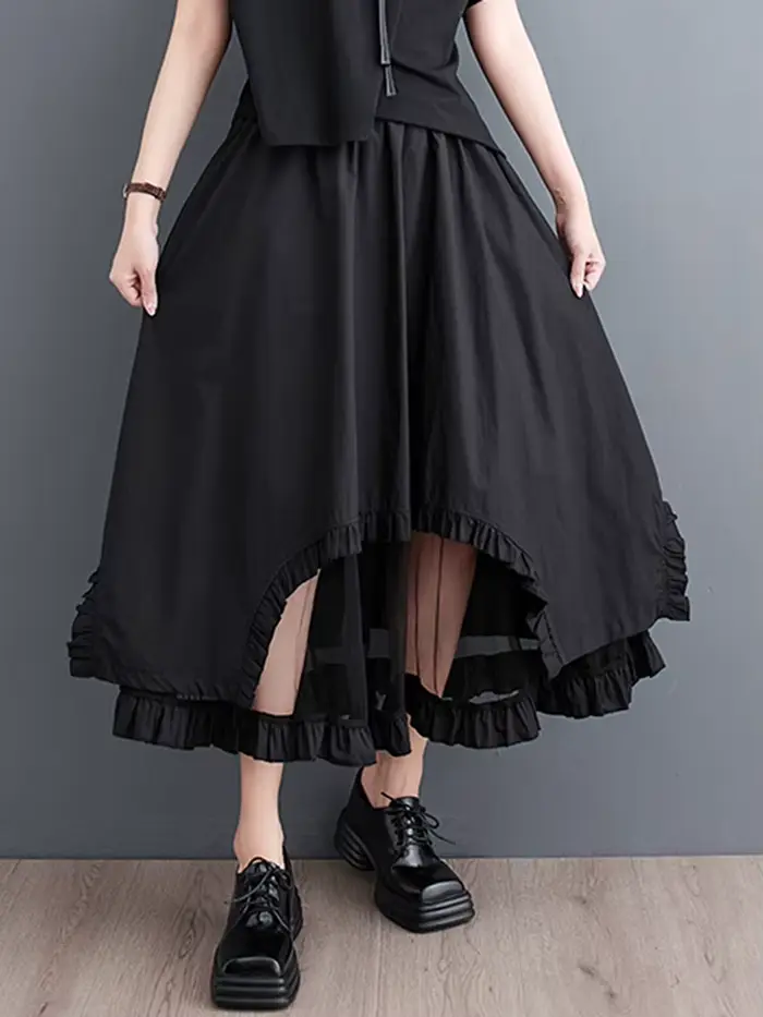 Jupe mi-longue décontractée noire vintage à empiècements en maille, taille haute, coupe irrégulière,