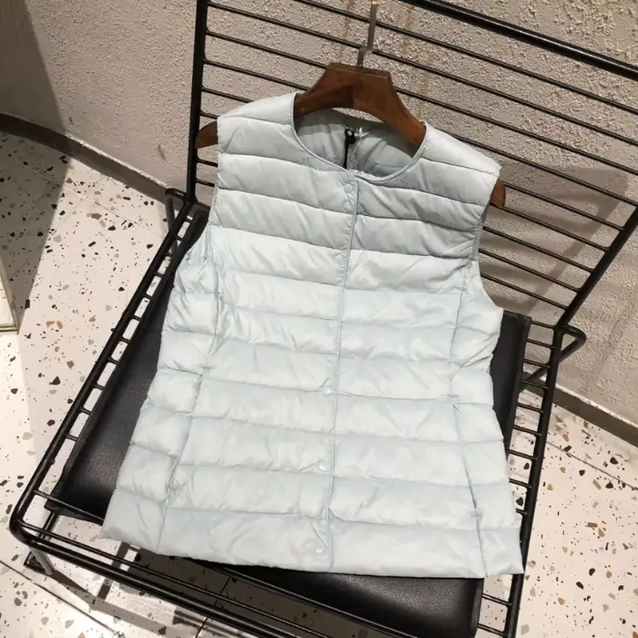Dámska bunda z bieleho kačacieho peria 90%