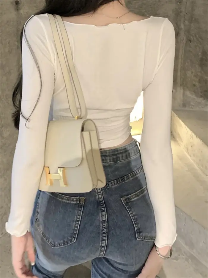 Manches longues T-shirts femmes récolte maigre résistant au soleil col en v rétro doux Sexy jeune St