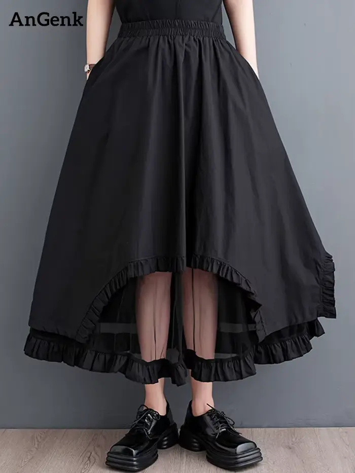 Jupe mi-longue décontractée noire vintage à empiècements en maille, taille haute, coupe irrégulière,