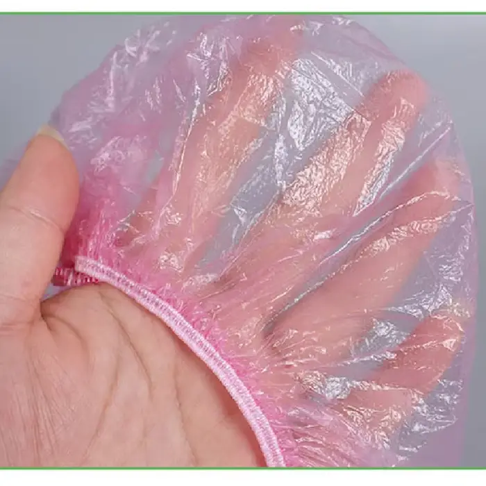 50/pièces/ensemble jetable en plastique douche bonnet de cheveux femmes imperméable rose Salon de Sp