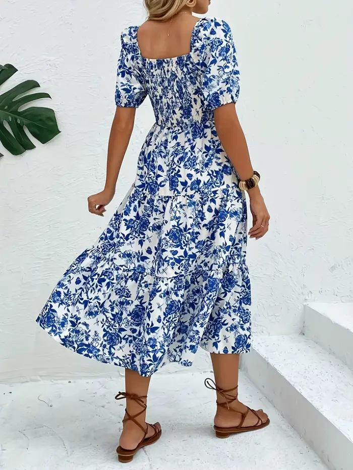 Elegantná dlhá šaty s kvetinovou potlačou
