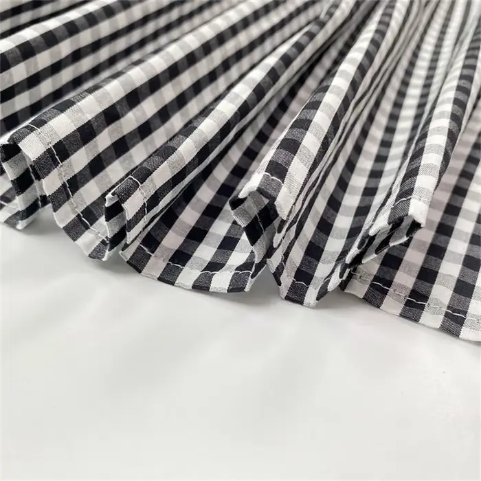 Yeezzi 2025 nouvelle mode Plaid revers chemise robe femmes manches à volants poches boutonnées fente