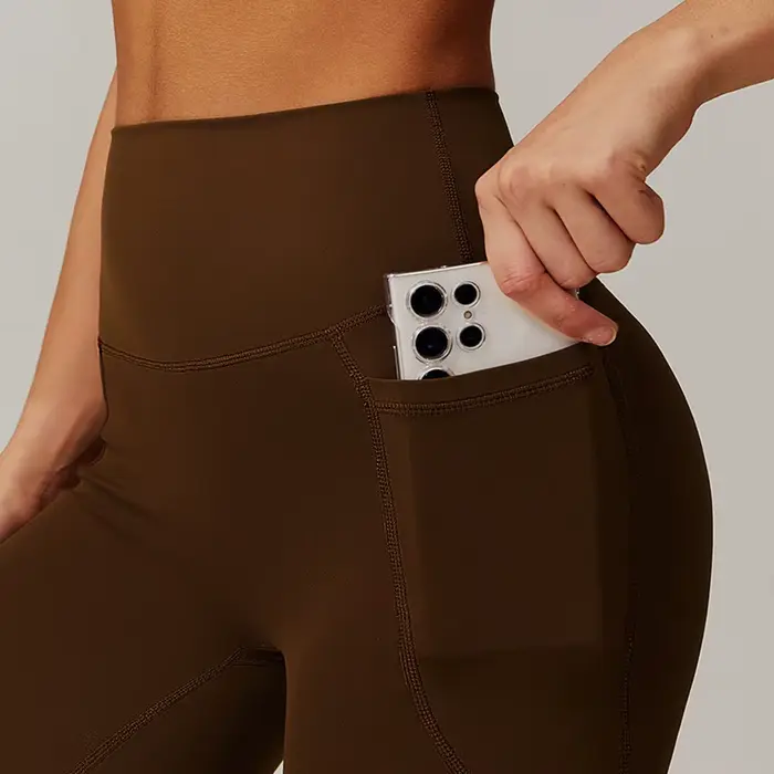 Dámske športové šortky z nylonu a elastanu s rovným vreckom na jogu a fitness