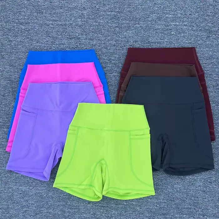 Dámske športové šortky z nylonu a elastanu s rovným vreckom na jogu a fitness