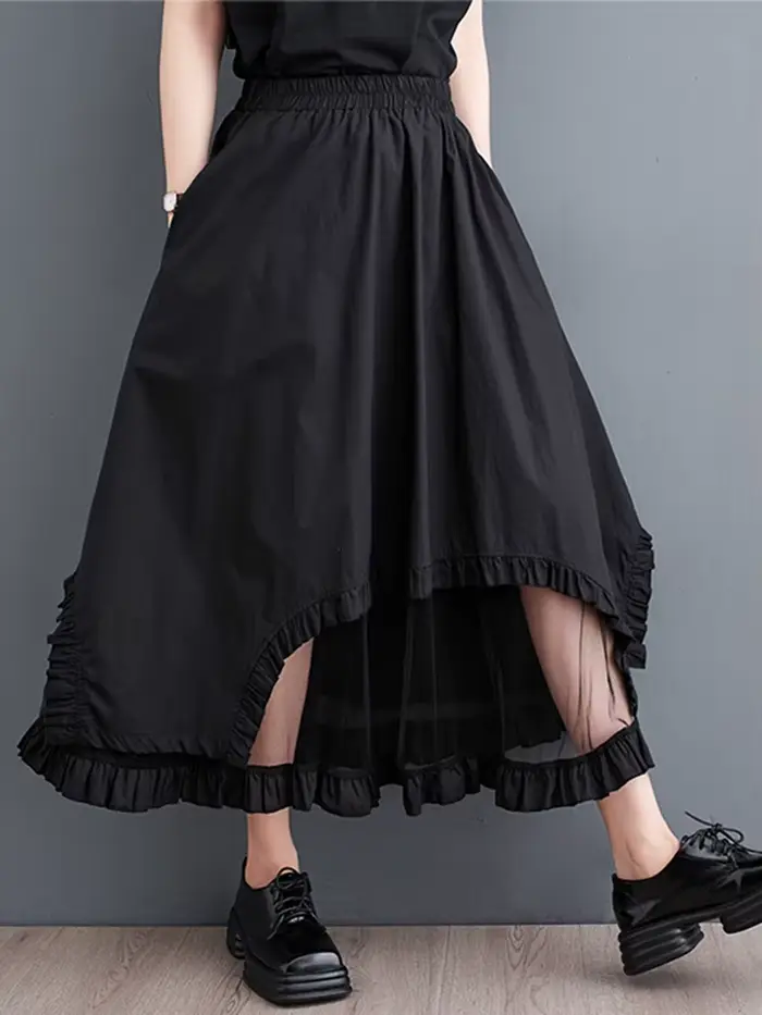 Jupe mi-longue décontractée noire vintage à empiècements en maille, taille haute, coupe irrégulière,