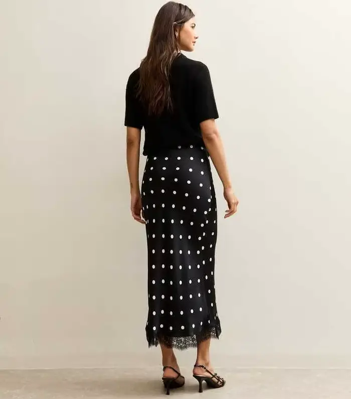 Dámske bodkované midi sukne